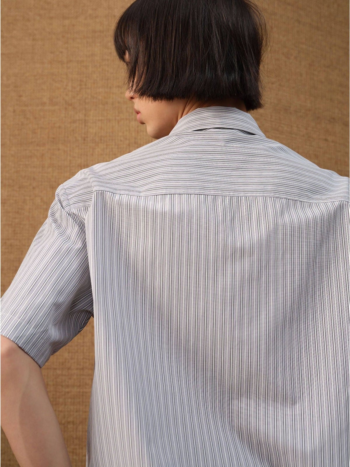 JCAESAR STUDIO Striped Short Sleeve Curved Hem Shirt in Gray - On Model