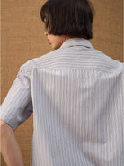 JCAESAR STUDIO Striped Short Sleeve Curved Hem Shirt in Gray - On Model