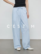 CEST M Striped Pima Cotton Shirt Pants Set in Sky Blue - On Female Model