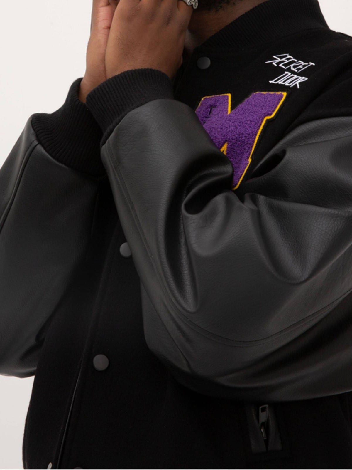 MEDM Wool Blend Varsity Jacket in Black - On Male Model