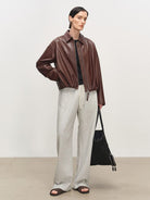 MSBEAST Gathered Hem Sheep Leather Jacket in Brown - On Female Model