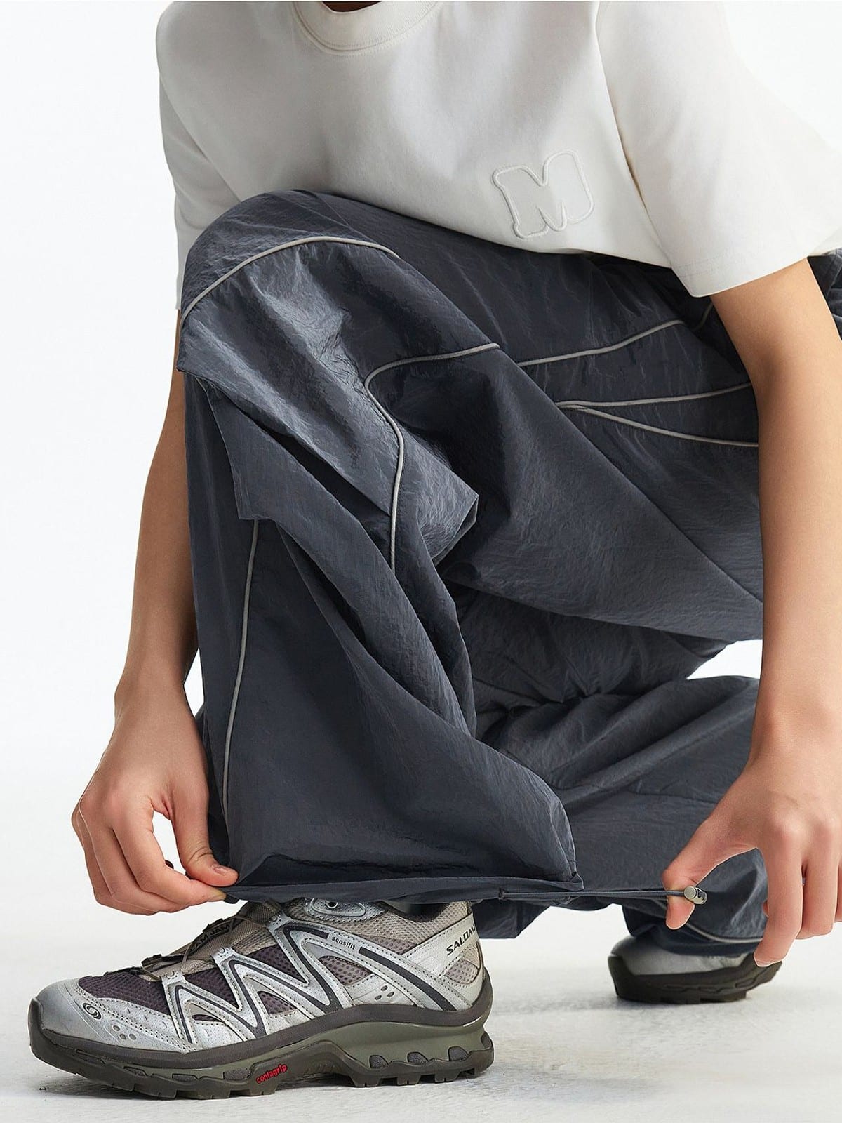 MEDM Glossy Piped Techwear Track Pants in Gray - On Model