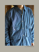 USAGE Cotton Chambray Safari Shirt in Denim - On Male Model
