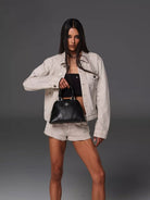 SMFK Medium Leather Shell Bag in Black - On Female Model