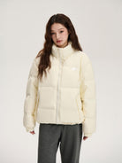 LOSTCTRL 90 White Duck Down Puffer Jacket in Cream - On Female Model
