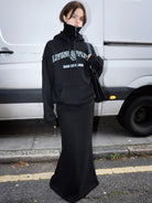 RARELY ALIKE Double Waistband Mermaid Maxi Skirt in Black - On Female Model
