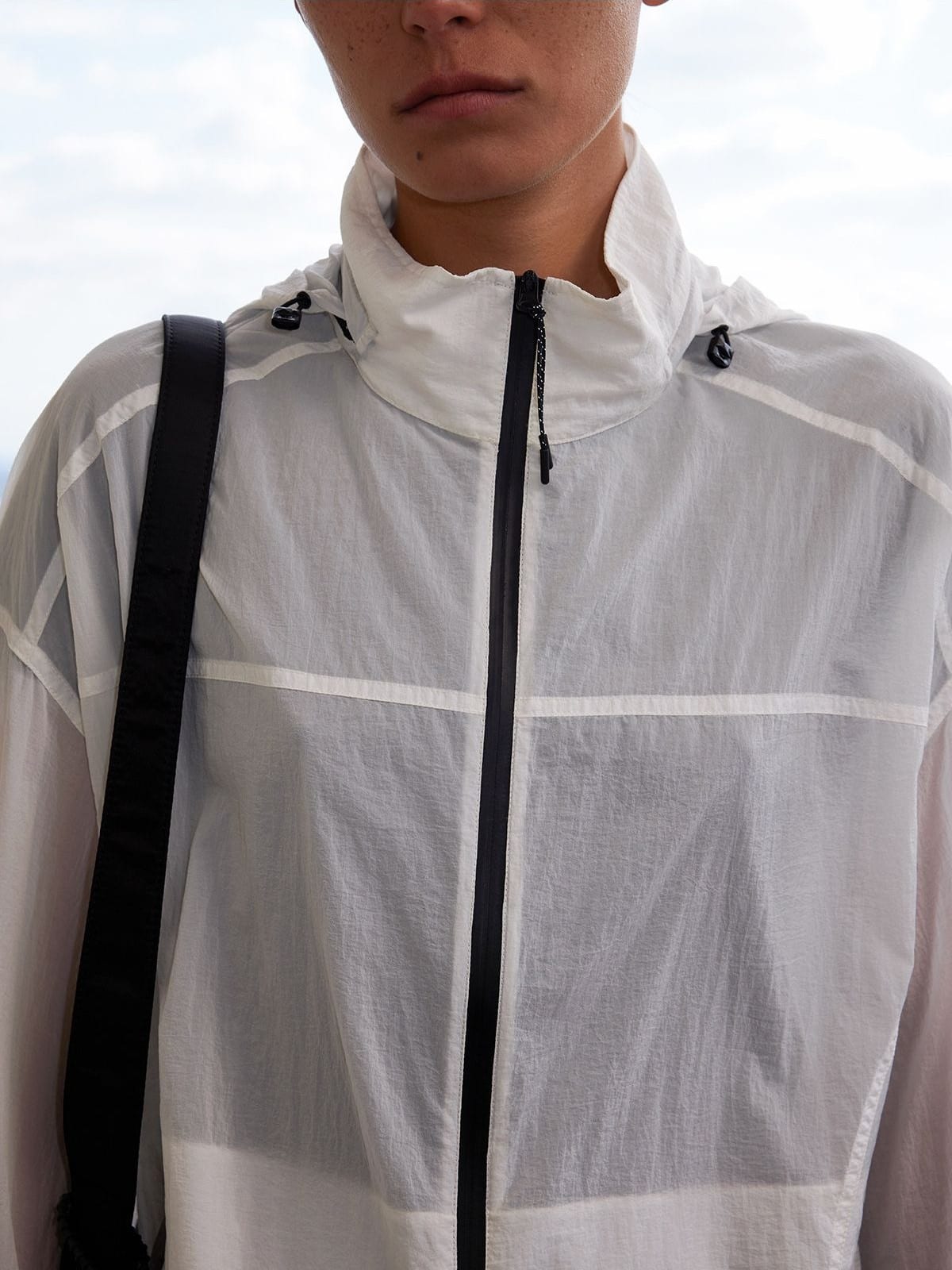 Random Piece Lightweight Cropped Hooded Nylon Jacket in White - On Female Model