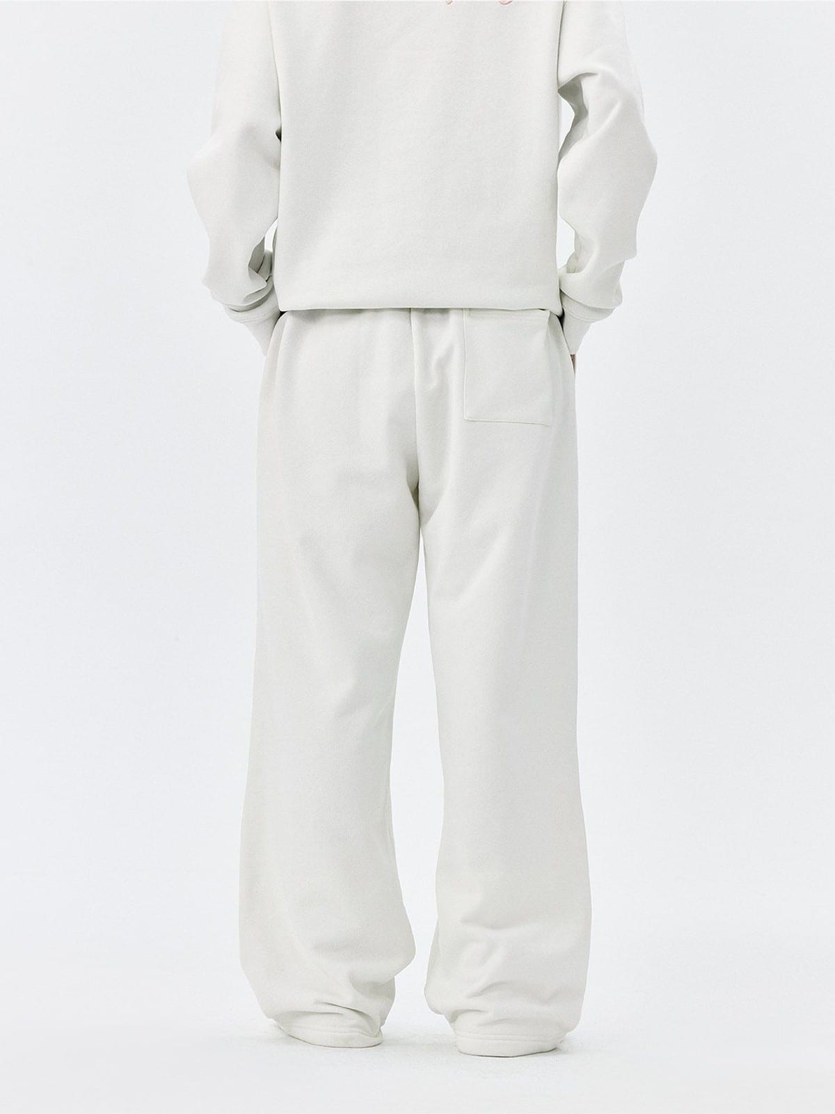 MEDM Fleece Lined Embroidered Sweatpants in White - On Model