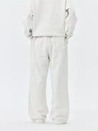 MEDM Fleece Lined Embroidered Sweatpants in White - On Model