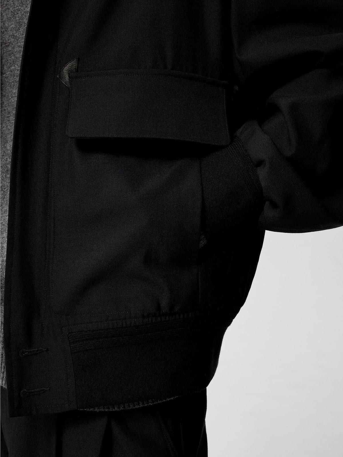 SIMPLE PROJECT Band Collar Worsted Wool Bomber Jacket in Black - On Model