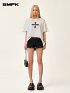 SMFK Cross Graphic Cotton T Shirt in White - On Female Model