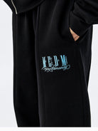 MEDM Cotton Blend Straight Leg Sweatpants in Black - On Model