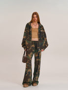 SMFK Cross Embroidered Zip Up Hoodie in Olive - On Female Model