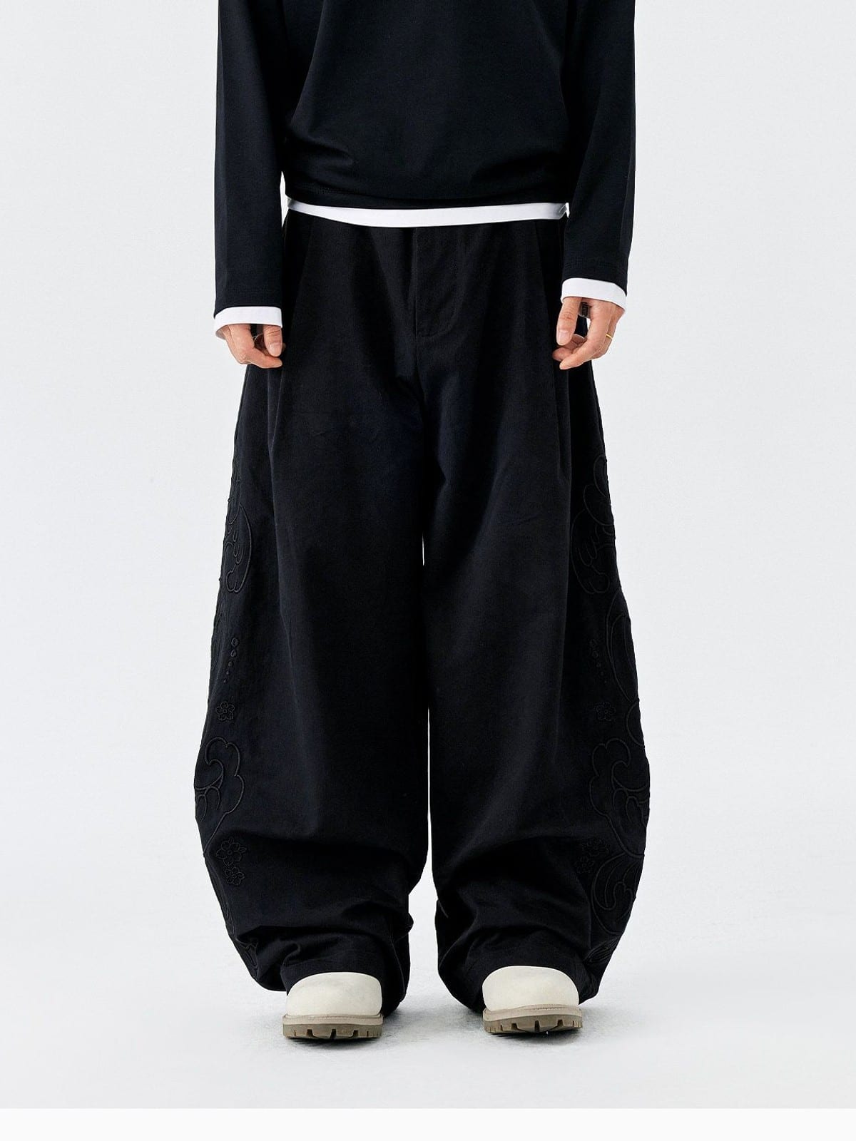 MEDM Embroidered Cotton Cargo Pants in Black - On Model