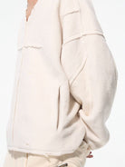D5ove Distressed V Neck Fleece Sweatshirt in Cream - On Male Model