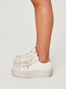 SMFK Distressed Canvas Skate Sneakers in White - On Female Model
