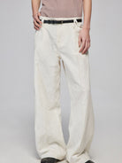 SIMPLE PROJECT Crinkled Straight Leg Trousers in White - On Model