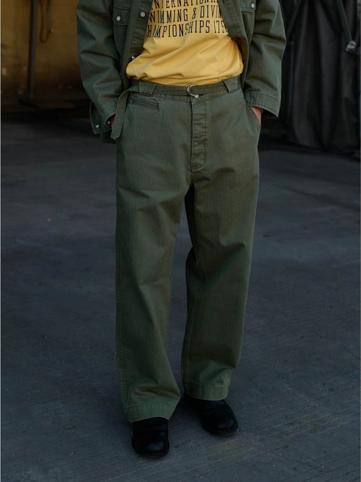 USAGE Heavyweight Herringbone Twill Belted Trousers in Olive - On Model