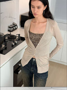 RARELY ALIKE Silk Wool V Neck Backless Cardigan in Olive - On Female Model