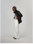 ACSENSE STUDIO Triangle Cut Sheepskin Jacket in Black - On Female Model