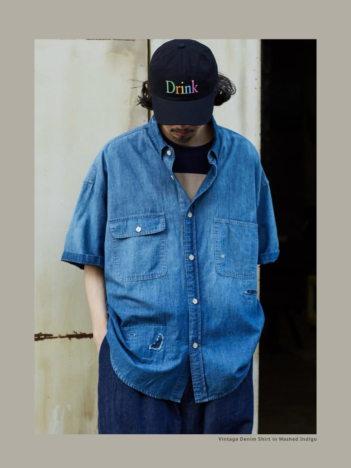 USAGE Distressed Short Sleeve Denim Shirt in Denim - On Male Model