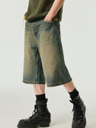 SIMPLE PROJECT Distressed Heavy Wash Denim Shorts in Blue - On Model