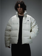 LOSTCTRL Minimalist Nylon Puffer Jacket in Cream - On Male Model