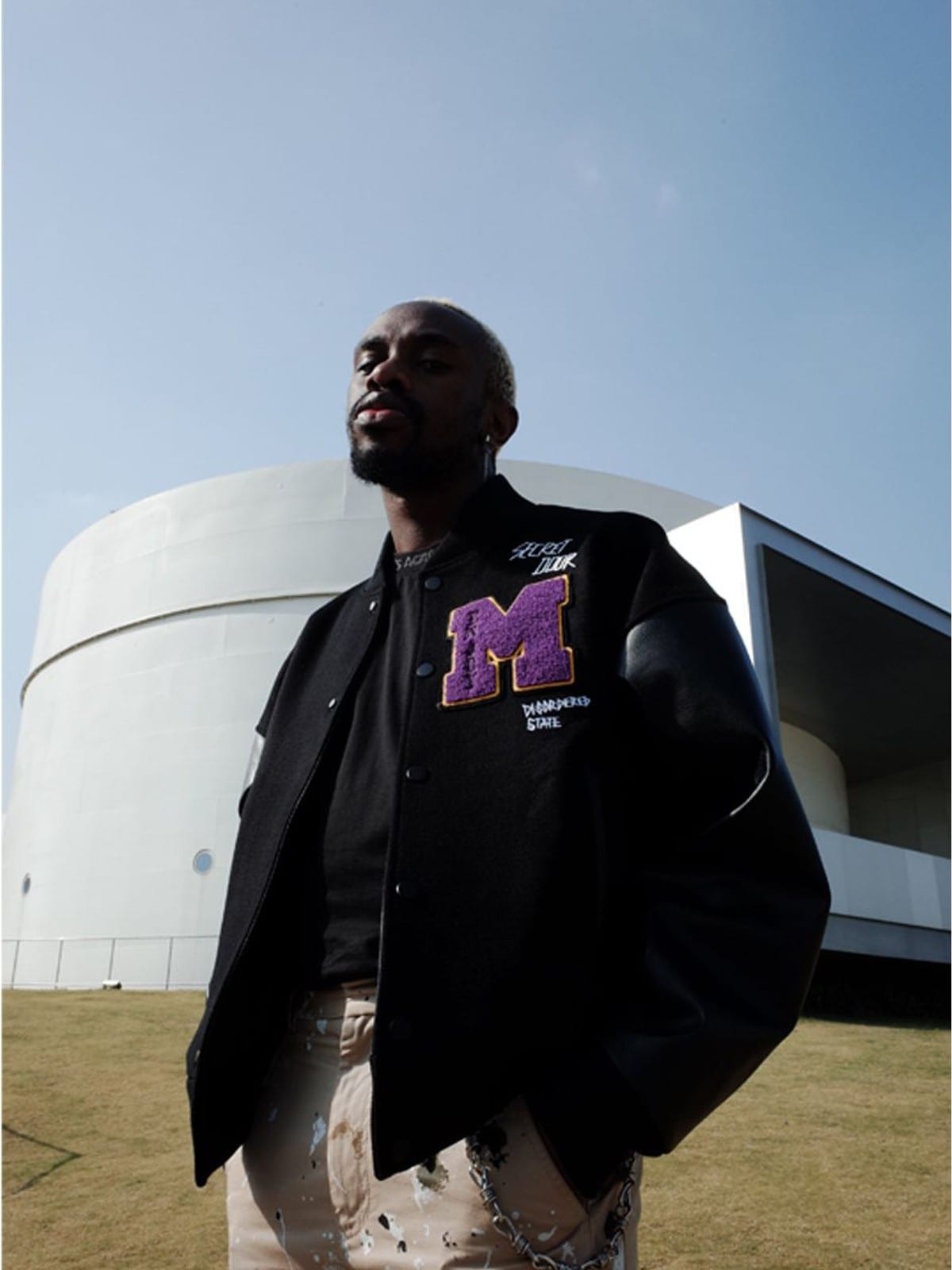 MEDM Wool Blend Varsity Jacket in Black - On Male Model