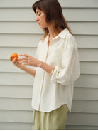 TEASEL Crinkled Silk Blend Short Sleeve Top in White - On Female Model