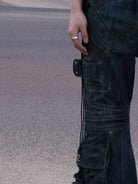PERSONSOUL Dirty Wash Drawstring Flare Jeans in Denim - On Male Model