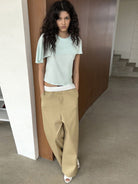 RARELY ALIKE Asymmetrical Draped Lyocell Blend Top in Mint - On Female Model