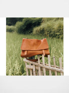QIUZHEN Vegetable Tanned Leather Messenger Bag in Brown - Lifestyle