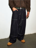MEDM Contrast Stitch Denim Cargo Jeans in Navy Blue - On Model