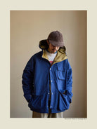 USAGE Cotton Nylon Hooded Mountain Parka in Blue - On Male Model
