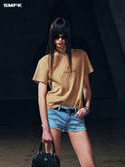 SMFK Vintage Wash Cross Graphic T Shirt in Beige - On Female Model