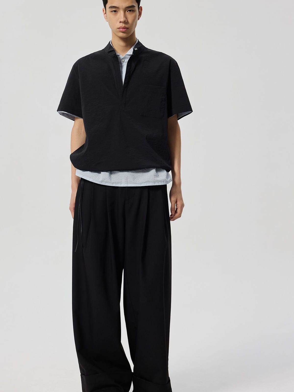 SIMPLE PROJECT Nylon Half Placket Short Sleeve Shirt in Black - On Male Model