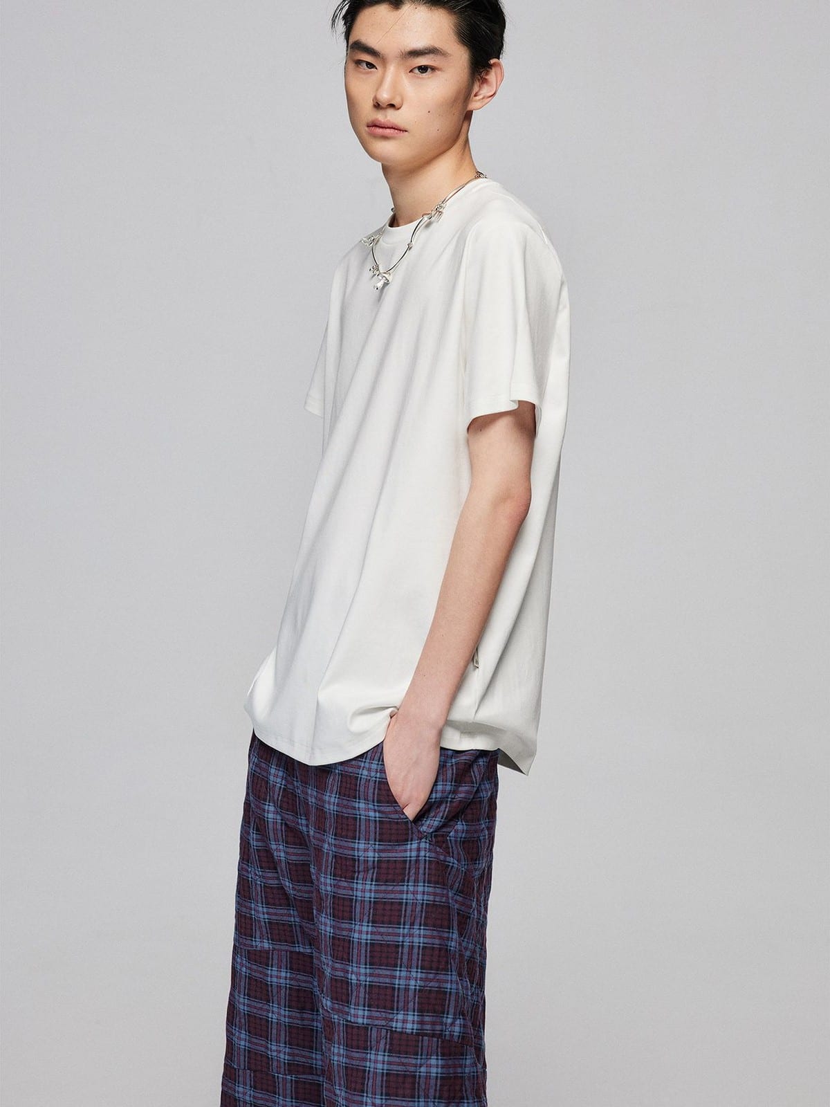 SIMPLE PROJECT Misaligned Seam Crewneck T Shirt in White - On Male Model