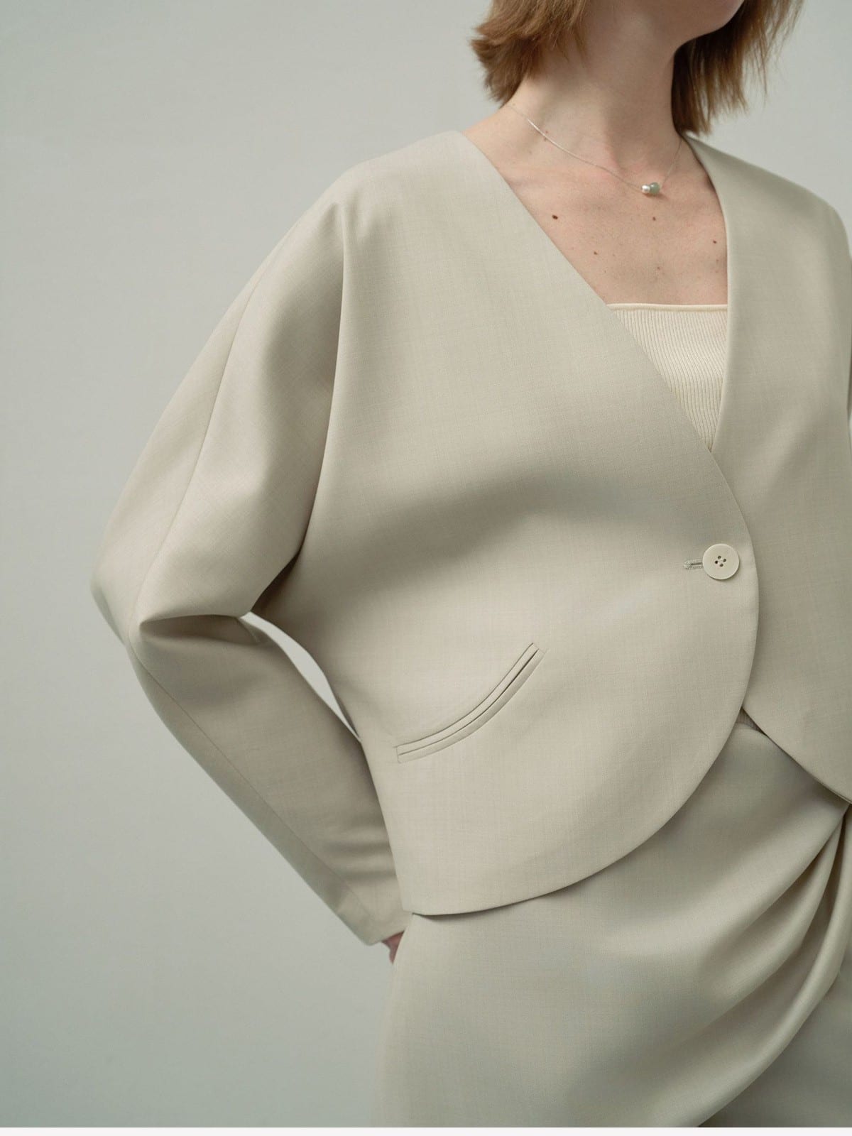 TEASEL Scalloped Edge Wool Blend Cropped Blazer in Green - On Female Model
