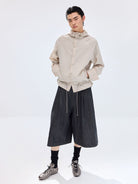 SIMPLE PROJECT Ramie Blend Selvedge Denim Cropped Shorts in Blue - On Male Model