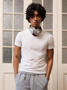Retro 21 Anti Wrinkle V Neck T Shirt in White - On Male Model