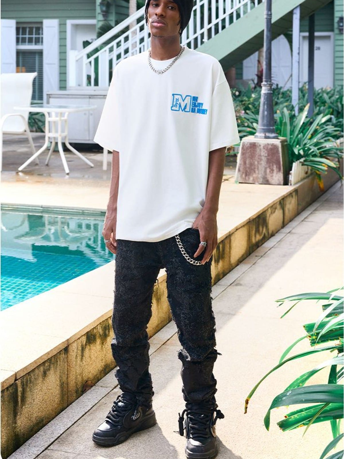 MEDM Half Sleeve Cotton Logo T Shirt in White - On Male Model