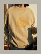 USAGE Washed Cotton Raglan Smiley Sweatshirt in Beige - On Model