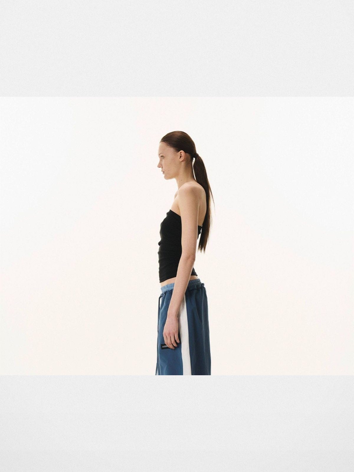 BLINDNOPLAN Contrast Panel Pleated Parachute Pants in Blue - On Female Model