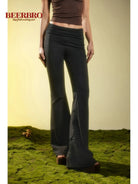 BeerBro Ruched Waist Stretch Flared Pants in Black - On Female Model
