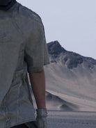 PERSONSOUL Deconstructed Distressed Cotton T Shirt in Gray - On Model
