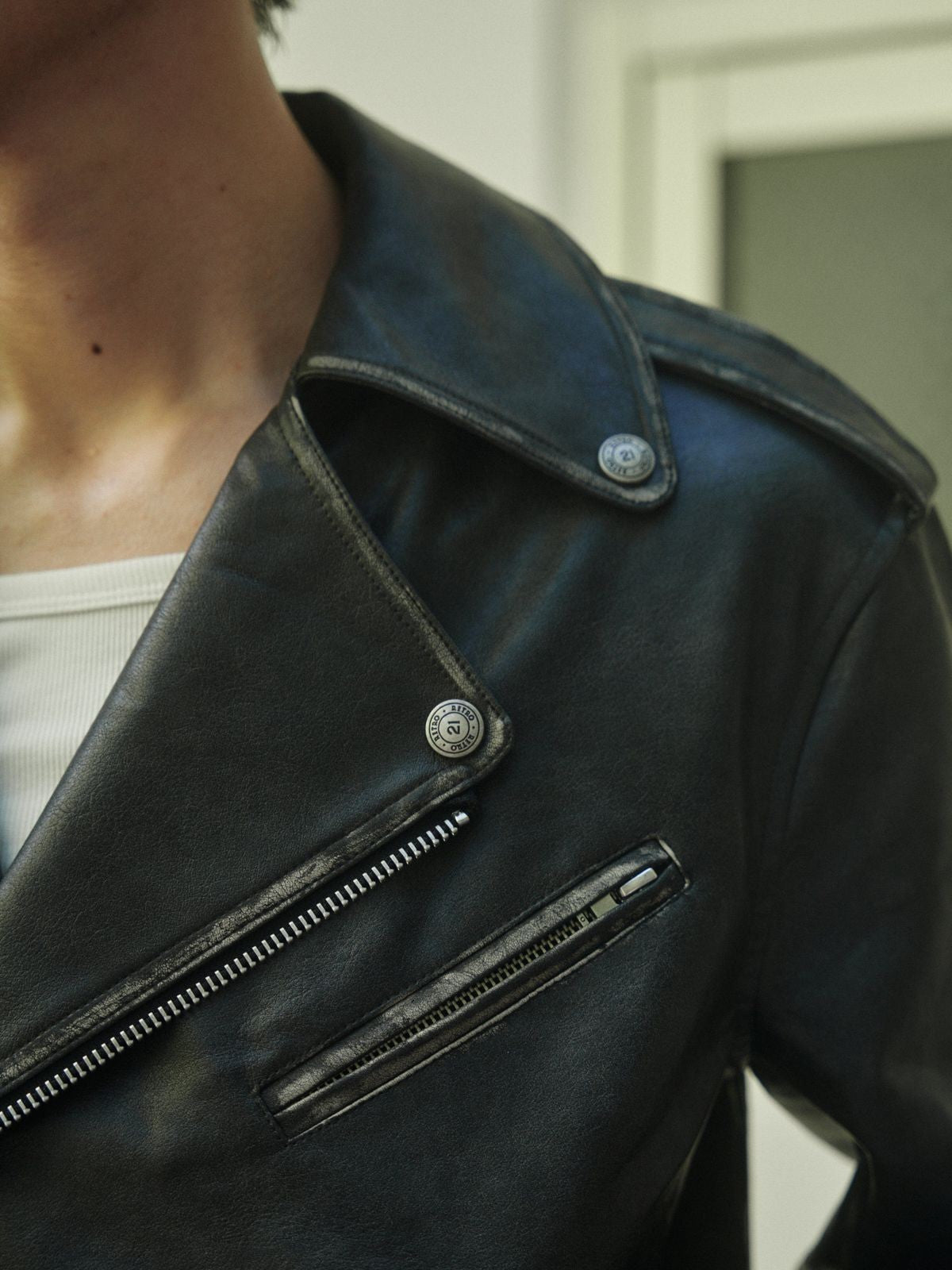 Retro 21 Distressed Faux Leather Biker Jacket in Black - On Male Model