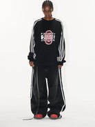 BLINDNOPLAN Color Block Graphic Raglan Sweatshirt in Black - On Female Model