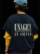 USAGE Raw Edge Cotton Short Sleeve Sweatshirt in Navy Blue - On Model