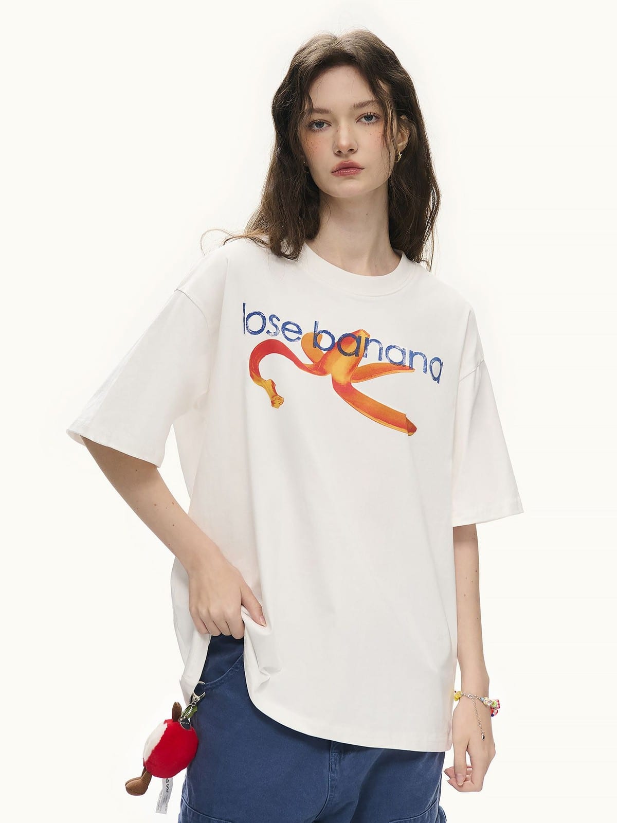 LOSTCTRL Distressed Banana Print Sorona T Shirt in White - On Female Model