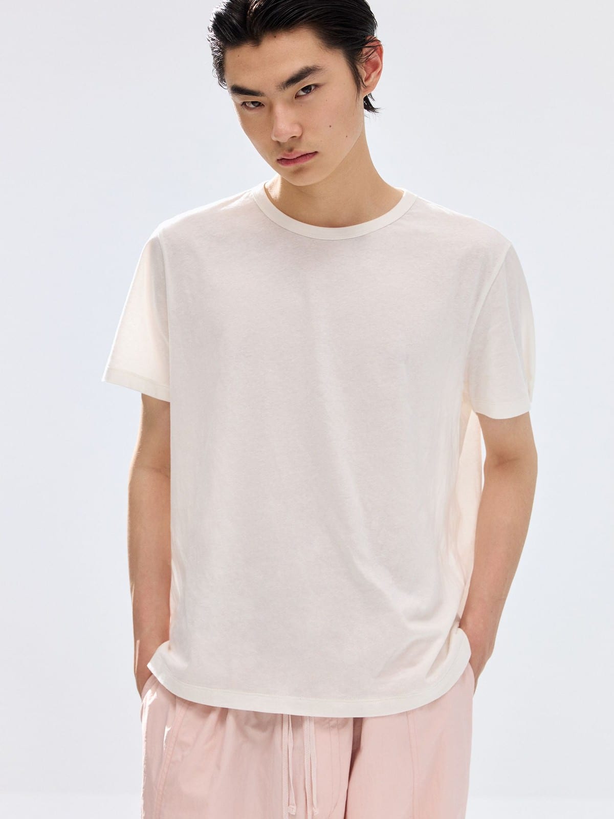 SIMPLE PROJECT Kapok Blend Crewneck T Shirt in Beige - On Male Model